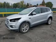 ✅ 2017 Ford Escape SE • VIN: 1FMCU9GDXHUC09809 • Lot: 82038585. Listed on Copart with 120,644 mi. Free auction sales archive from the USA and detailed vehicle history report at DreamBid. Image 1.