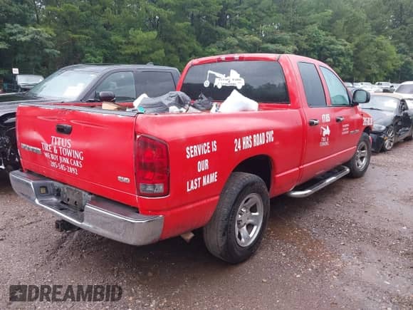 2003 Dodge 1500 ST z VIN 1D7HA18N03S112530, wystawiony jako IAAI lot #42484127 z przebiegiem 186 784 mil mil oraz . Historia ofert i sprzedaży dostępna na DreamBid. Obrazek 4.