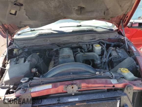 2006 Dodge 3500 SLT z VIN 3D7MX48CX6G279261, wystawiony jako Copart lot #58109754 z przebiegiem 243 342 mil mil oraz Nie do naprawy • Non repairable. Historia ofert i sprzedaży dostępna na DreamBid. Obrazek 11.