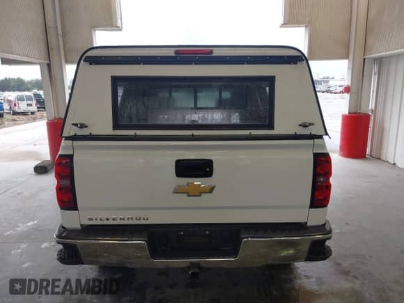 2014 Chevrolet Silverado 1500 Work Truck with VIN 3GCPCPEC9EG205529, listed as a IAAI auction lot 41389123 with 106,532 mi miles and . Bid and sale history available at DreamBid. Image 16.