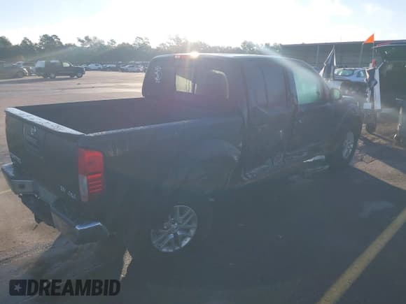 ✅ 2019 Nissan Frontier SV • VIN: 1N6AD0EVXKN730014 • Lot: 43554724. Listed on IAAI with 128,341 mi. Free auction sales archive from the USA and detailed vehicle history report at DreamBid. Image 4.