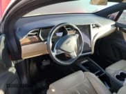 ✅ 2016 Tesla Model X 70D • VIN: 5YJXCAE2XGF030219 • Lot: 69866832. Listed on Copart with Not provided. Free auction sales archive from the USA and detailed vehicle history report at DreamBid. Image 8.