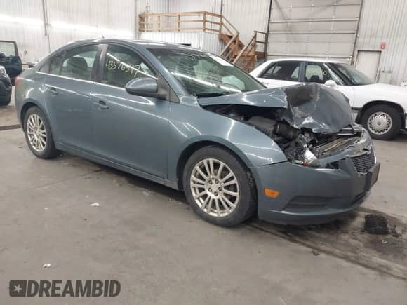 2012 Chevrolet Cruze ECO z VIN 1G1PJ5SC9C7247585, wystawiony jako IAAI lot #43576547 z przebiegiem 245 924 mil mil oraz . Historia ofert i sprzedaży dostępna na DreamBid. Obrazek 1.