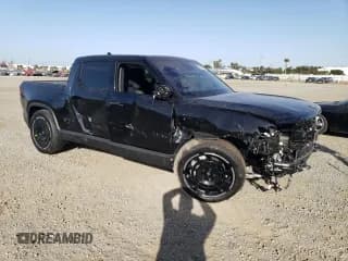 ✅ 2025 Rivian R1T Adventure • VIN: 7FCTGBAAXSN034913 • Lot: 84843944. Listed on Copart with Not provided. Free auction sales archive from the USA and detailed vehicle history report at DreamBid. Image 4.