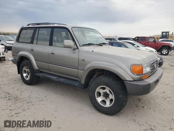 ✅ 1997 Toyota Land Cruiser • VIN: JT3HJ85J6V0170911 • Лот: 71258785. Опубликован ранее на Copart с пробегом 206 192 миль. Бесплатный доступ к архиву аукционных продаж из США и подробный отчёт об истории автомобиля на DreamBid. Изображение 4.