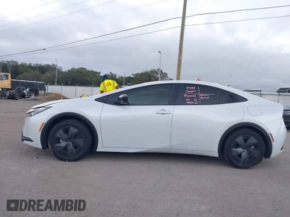 2024 Toyota Prius LE with VIN JTDACAAU6R3035544, listed as a IAAI auction lot 43413536 with 19,097 mi miles and . Bid and sale history available at DreamBid. Image 14.