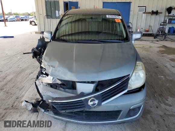 ✅ 2009 Nissan Versa S • VIN: 3N1BC13E39L500380 • Лот: 87053475. Опубликован ранее на Copart с пробегом 175 116 миль. Бесплатный доступ к архиву аукционных продаж из США и подробный отчёт об истории автомобиля на DreamBid. Изображение 5.