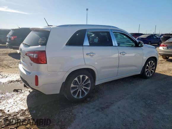 ✅ 2014 Kia Sorento SX • VIN: 5XYKW4A71EG441468 • Лот: 66692685. Опубликован ранее на Copart с пробегом 161 686 миль. Бесплатный доступ к архиву аукционных продаж из США и подробный отчёт об истории автомобиля на DreamBid. Изображение 3.