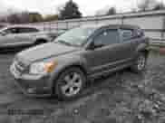 2012 Dodge Caliber SXT z VIN 1C3CDWDA2CD507880, wystawiony jako Copart lot #80936024 z przebiegiem 136 703 mil mil oraz Czysty tytuł • Clean title. Historia ofert i sprzedaży dostępna na DreamBid. Obrazek 1.