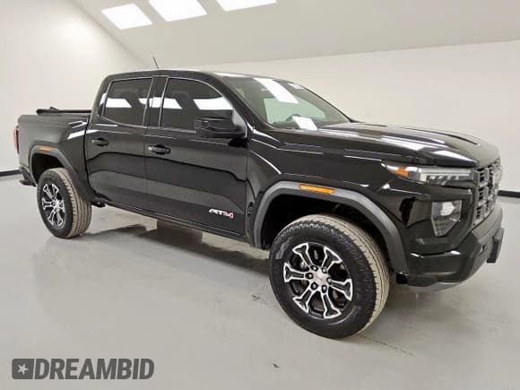 ✅ 2023 GMC Canyon 4WD AT4 • VIN: 1GTP6DEK1P1216751 • Лот: 68849485. Опубликован ранее на Copart с пробегом 66 879 миль. Бесплатный доступ к архиву аукционных продаж из США и подробный отчёт об истории автомобиля на DreamBid. Изображение 4.
