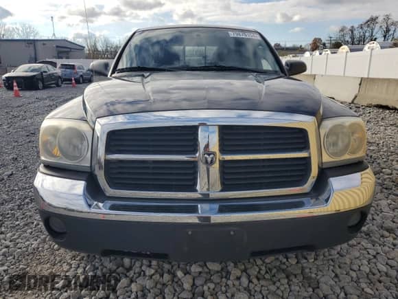 2005 Dodge Dakota SLT z VIN 1D7HE48N25S304783, wystawiony jako Copart lot #79870154 z przebiegiem 205 493 mil mil oraz Czysty tytuł • Clean title. Historia ofert i sprzedaży dostępna na DreamBid. Obrazek 5.