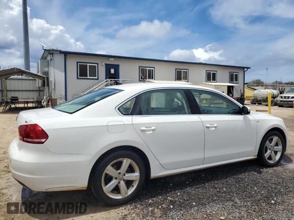 ✅ 2014 Volkswagen Passat Wolfsburg Edition • VIN: 1VWAT7A33EC022610 • Lot: 51135715. Listed on Copart with 94,537 mi. Free auction sales archive from the USA and detailed vehicle history report at DreamBid. Image 3.