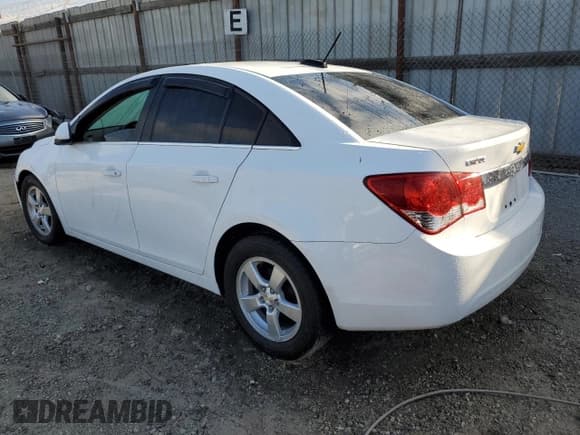✅ 2015 Chevrolet Cruze LT • VIN: 1G1PC5SB7F7236736 • Lot: 84290045. Listed on Copart with 61,371 mi. Free auction sales archive from the USA and detailed vehicle history report at DreamBid. Image 2.