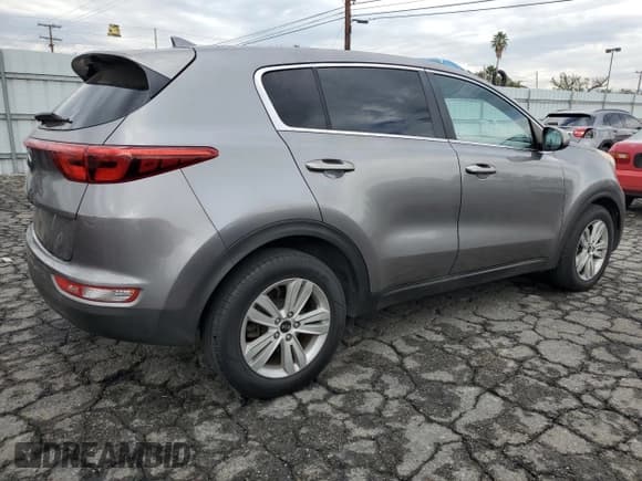 ✅ 2017 Kia Sportage LX • VIN: KNDPM3AC0H7078231 • Lot: 82372815. Listed on Copart with 90,796 mi. Free auction sales archive from the USA and detailed vehicle history report at DreamBid. Image 3.