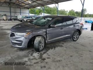 ✅ 2019 Acura RDX Technology • VIN: 5J8TC1H58KL001975 • Лот: 67727565. Опубликован ранее на Copart с пробегом 105 161 миль. Бесплатный доступ к архиву аукционных продаж из США и подробный отчёт об истории автомобиля на DreamBid. Изображение 1.