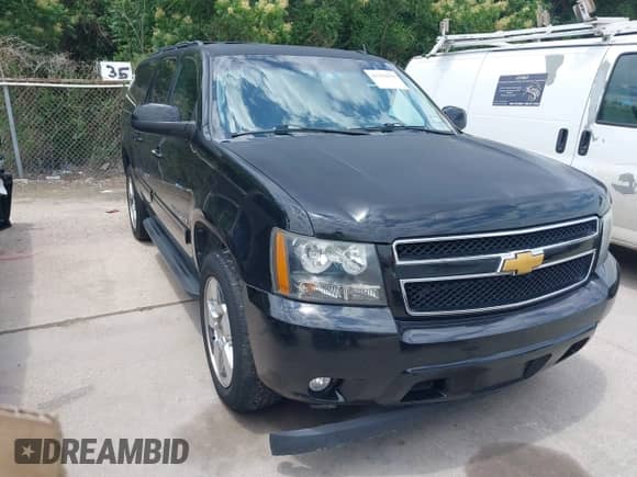 2014 Chevrolet Suburban LT z VIN 1GNSCJE09ER246246, wystawiony jako IAAI lot #42362059 z przebiegiem 321 684 mil mil oraz . Historia ofert i sprzedaży dostępna na DreamBid. Obrazek 1.