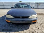 ✅ 1995 Toyota Camry LE • VIN: JT2GK12E3S0117364 • Lot: 65818255. Wystawiony na Copart z przebiegiem 215 464 mil. Bezpłatny archiwum sprzedaży aukcyjnych z USA i szczegółowy raport historii pojazdu na DreamBid. Zdjęcie 5.