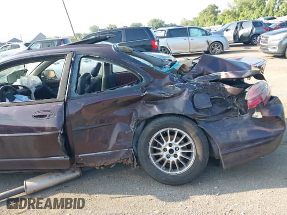 ✅ 2002 Pontiac Grand Prix GTP • VIN: 1G2WR121X2F213750 • Lot: 42981975. Listed on IAAI with 156,049 mi. Free auction sales archive from the USA and detailed vehicle history report at DreamBid. Image 11.