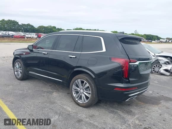 ✅ 2023 Cadillac XT6 FWD Premium Luxury • VIN: 1GYKPCRS6PZ106284 • Lot: 41595617. Listed on IAAI with 32,795 mi. Free auction sales archive from the USA and detailed vehicle history report at DreamBid. Image 3.