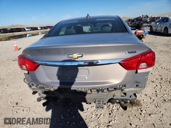 2019 Chevrolet Impala Premier z VIN 1G1105S35KU126237, wystawiony jako Copart lot #90950075 z przebiegiem 103 875 mil mil oraz Szkoda całkowita • Salvage title. Historia ofert i sprzedaży dostępna na DreamBid. Obrazek 6.