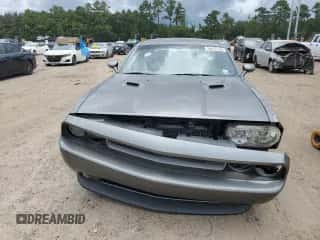 2012 Dodge Challenger R/T z VIN 2C3CDYBT1CH201725, wystawiony jako Copart lot #69679104 z przebiegiem 174 416 mil mil oraz Szkoda całkowita • Salvage title. Historia ofert i sprzedaży dostępna na DreamBid. Obrazek 5.