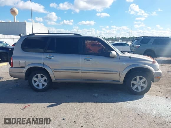 ✅ 2003 Suzuki XL7 Touring • VIN: JS3TX92V934102093 • Lot: 43710578. Listed on IAAI with 89,189 mi. Free auction sales archive from the USA and detailed vehicle history report at DreamBid. Image 13.