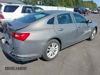 2017 Chevrolet Malibu LT z VIN 1G1ZE5ST0HF150785, wystawiony jako IAAI lot #43183540 z przebiegiem 145 316 mil mil oraz . Historia ofert i sprzedaży dostępna na DreamBid. Obrazek 4.