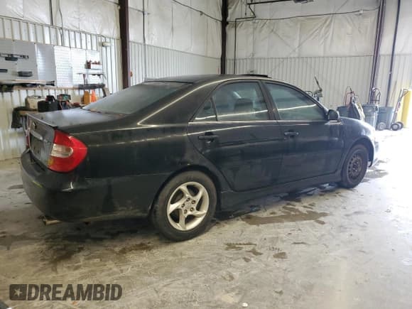 ✅ 2003 Toyota Camry SE • VIN: JTDBE32K830240816 • Lot: 90244385. Listed on Copart with 319,607 mi. Free auction sales archive from the USA and detailed vehicle history report at DreamBid. Image 3.