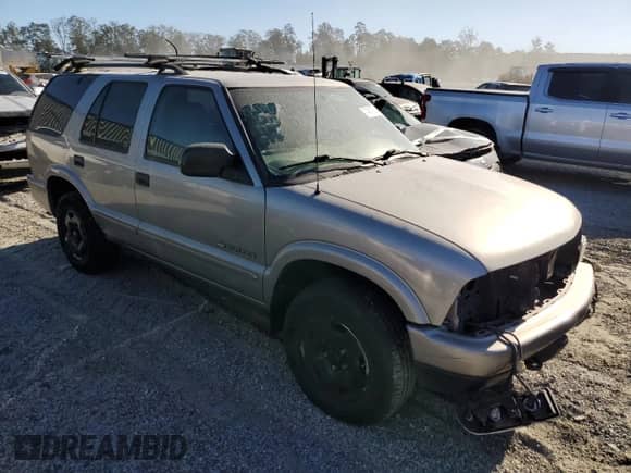 2004 Chevrolet Blazer LS z VIN 1GNDT13X04K168259, wystawiony jako Copart lot #74519744 z przebiegiem 126 248 mil mil oraz Szkoda całkowita • Salvage title. Historia ofert i sprzedaży dostępna na DreamBid. Obrazek 4.
