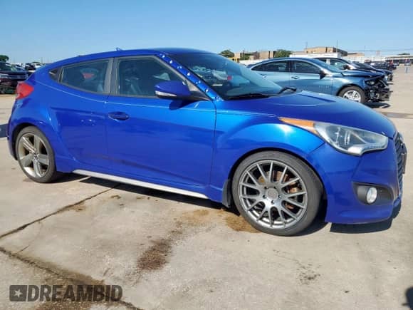 2013 Hyundai Veloster Turbo с VIN KMHTC6AE1DU164742, выставлен на аукционе Copart как лот 56278785 с пробегом 106 522 миль миль и Списание • Salvage title. История ставок и продаж доступна на DreamBid. Изображение 4.
