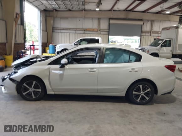 ✅ 2021 Subaru Impreza Premium • VIN: 4S3GKAD62M3600780 • Лот: 42750352. Опубликован ранее на IAAI с пробегом 41 931 миль. Бесплатный доступ к архиву аукционных продаж из США и подробный отчёт об истории автомобиля на DreamBid. Изображение 14.