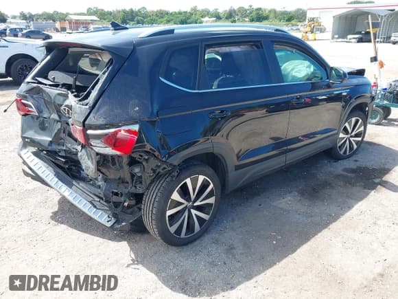 ✅ 2022 Volkswagen Taos SE • VIN: 3VVRX7B20NM035413 • Лот: 43280456. Опубликован ранее на IAAI с пробегом 95 276 миль. Бесплатный доступ к архиву аукционных продаж из США и подробный отчёт об истории автомобиля на DreamBid. Изображение 4.