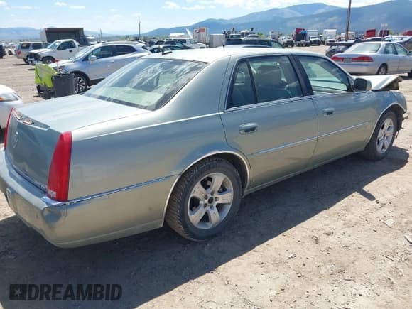 ✅ 2006 Cadillac DTS 1SB • VIN: 1G6KD57Y86U241783 • Лот: 42201567. Опубликован ранее на IAAI с пробегом 126 694 миль. Бесплатный доступ к архиву аукционных продаж из США и подробный отчёт об истории автомобиля на DreamBid. Изображение 4.