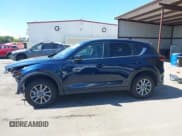 ✅ 2023 Mazda CX-5 S Carbon Edition • VIN: JM3KFBCMXP0282649 • Lot: 42784337. Listed on IAAI with 25,589 mi. Free auction sales archive from the USA and detailed vehicle history report at DreamBid. Image 15.