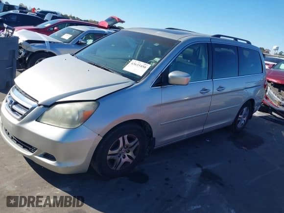 ✅ 2005 Honda Odyssey EX-L • VIN: 5FNRL38655B036820 • Lot: 43633450. Listed on IAAI with 207,568 mi. Free auction sales archive from the USA and detailed vehicle history report at DreamBid. Image 17.