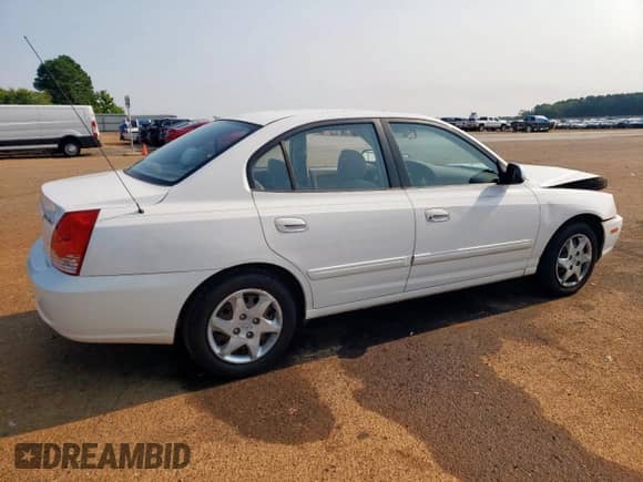 2004 Hyundai Elantra GLS with VIN KMHDN46D24U728241, listed as a Copart auction lot 68002955 with 242,945 mi miles and Salvage title. Bid and sale history available at DreamBid. Image 3.