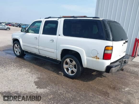 2005 Chevrolet Suburban LS z VIN 1GNFK16Z85J256010, wystawiony jako IAAI lot #42768572 z przebiegiem 260 000 mil mil oraz . Historia ofert i sprzedaży dostępna na DreamBid. Obrazek 3.