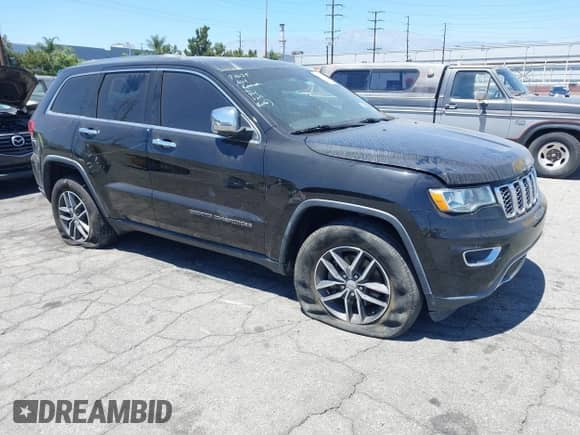 2018 Jeep Grand Cherokee Limited z VIN 1C4RJEBG5JC512008, wystawiony jako IAAI lot #42897081 z przebiegiem 141 938 mil mil oraz . Historia ofert i sprzedaży dostępna na DreamBid. Obrazek 1.