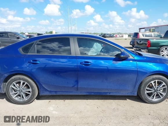 ✅ 2023 Kia Forte LXS • VIN: 3KPF24AD8PE683578 • Lot: 43293302. Listed on IAAI with 14,532 mi. Free auction sales archive from the USA and detailed vehicle history report at DreamBid. Image 13.