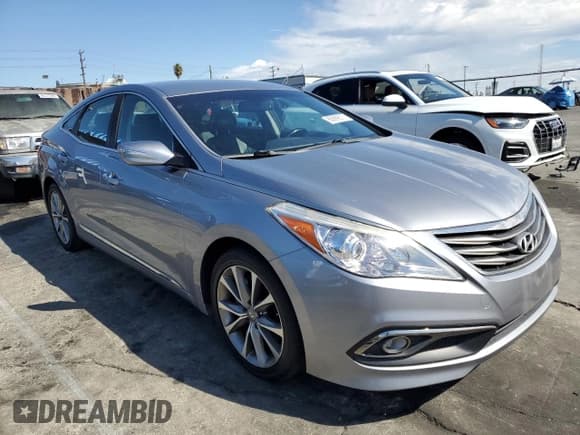 ✅ 2015 Hyundai Azera • VIN: KMHFG4JG6FA463476 • Lot: 85899515. Listed on Copart with 140,245 mi. Free auction sales archive from the USA and detailed vehicle history report at DreamBid. Image 4.