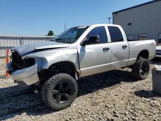 2006 Dodge 1500 Laramie z VIN 1D7HU18246S615785, wystawiony jako Copart lot #65217895 z przebiegiem 160 811 mil mil oraz Czysty tytuł • Clean title. Historia ofert i sprzedaży dostępna na DreamBid. Obrazek 1.