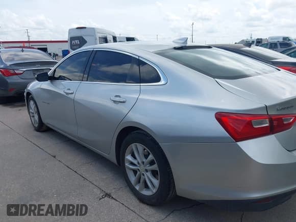 ✅ 2018 Chevrolet Malibu LT • VIN: 1G1ZD5ST0JF143540 • Lot: 42737601. Listed on IAAI with 142,193 mi. Free auction sales archive from the USA and detailed vehicle history report at DreamBid. Image 14.