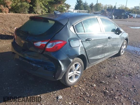 ✅ 2018 Chevrolet Cruze LT • VIN: 3G1BE6SM7JS645177 • Lot: 43475388. Listed on IAAI with 107,539 mi. Free auction sales archive from the USA and detailed vehicle history report at DreamBid. Image 4.