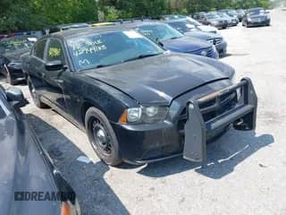 2014 Dodge Charger Police with VIN 2C3CDXKTXEH364578, listed as a IAAI auction lot 42749163 with 121,344 mi miles and . Bid and sale history available at DreamBid. Image 1.
