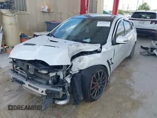 ✅ 2015 Mitsubishi Lancer Evolution Final Edition • VIN: JA32W7FVXFU027564 • Lot: 41941191. Listed on IAAI with 52,235 mi. Free auction sales archive from the USA and detailed vehicle history report at DreamBid. Image 2.