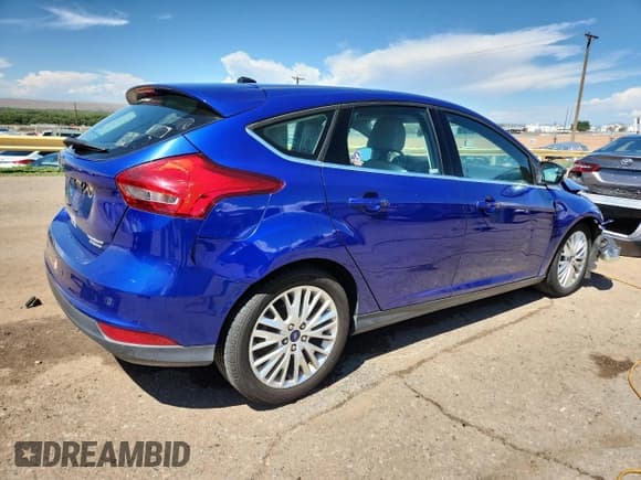✅ 2015 Ford Focus Titanium • VIN: 1FADP3N27FL379763 • Lot: 71919255. Listed on Copart with 66,838 mi. Free auction sales archive from the USA and detailed vehicle history report at DreamBid. Image 3.
