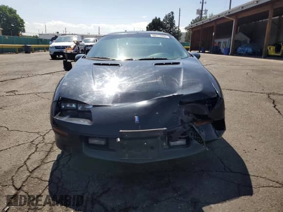 1997 Chevrolet Camaro z VIN 2G1FP22K9V2126324, wystawiony jako Copart lot #60117095 z przebiegiem 179 786 mil mil oraz Szkoda całkowita • Salvage title. Historia ofert i sprzedaży dostępna na DreamBid. Obrazek 5.