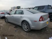 ✅ 2012 Chevrolet Malibu LTZ • VIN: 1G1ZG5E73CF137482 • Lot: 64024624. Listed on Copart with 269,196 mi. Free auction sales archive from the USA and detailed vehicle history report at DreamBid. Image 2.