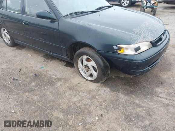 ✅ 1999 Toyota Corolla VE • VIN: 2T1BR12E4XC124432 • Лот: 42842460. Опубликован ранее на IAAI с пробегом 286 745 миль. Бесплатный доступ к архиву аукционных продаж из США и подробный отчёт об истории автомобиля на DreamBid. Изображение 6.