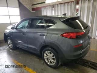 2019 Hyundai Tucson SE z VIN KM8J23A47KU000313, wystawiony jako Copart lot #90115815 z przebiegiem 99 228 mil mil oraz Czysty tytuł • Clean title. Historia ofert i sprzedaży dostępna na DreamBid. Obrazek 2.